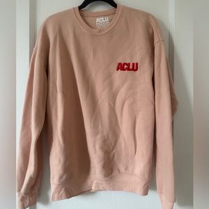 Pink ACLU sweatshirt with red text